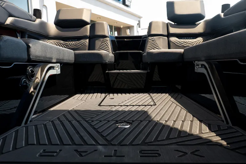 Slide: The Image of 2026 MasterCraft XStar 25 interior with luxurious seating and modern design. - 26