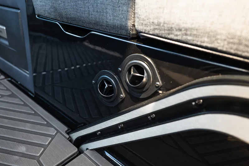 Slide: The Image of 2026 MasterCraft XStar 25 interior detail with sleek black panel and modern air vents. - 28