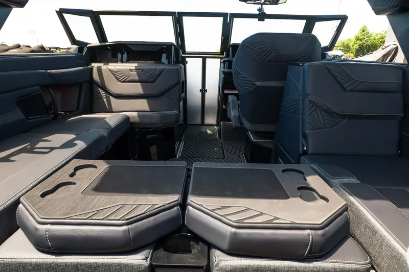 Slide: The Image of Interior of 2026 MasterCraft XStar 25 boat with luxurious seating and modern design. - 32