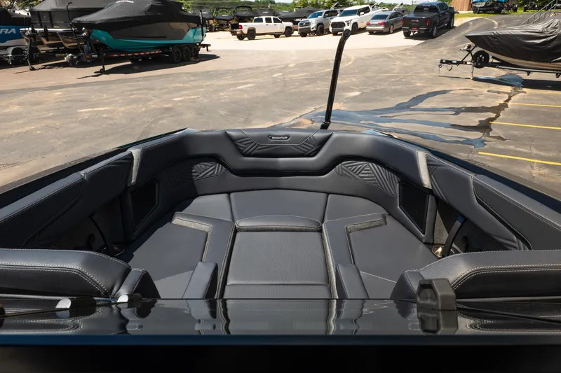 Slide: The Image of Interior view of 2026 MasterCraft XStar 25 boat with luxurious seating. - 34
