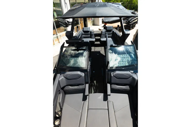 Slide: The Image of 2026 MasterCraft XStar 25 boat interior with sleek seating and modern design. - 47