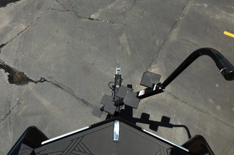 Slide: The Image of Top view of 2026 MasterCraft XStar 25 boat trailer hitch on asphalt. - 48