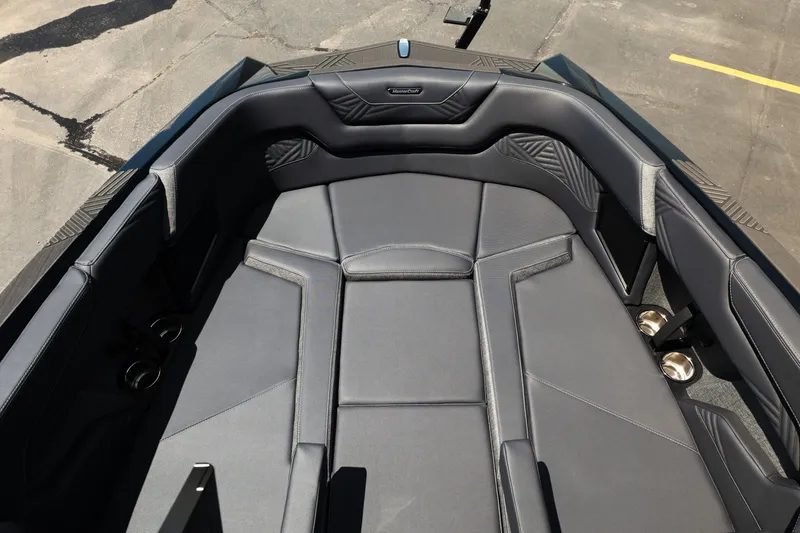 Slide: The Image of 2026 MasterCraft XStar 25 boat interior with sleek, modern seating design. - 52