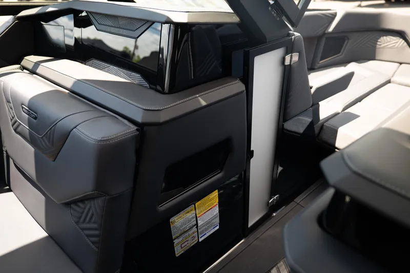 Slide: The Image of Interior of 2026 MasterCraft XStar 25 boat with sleek seating and modern design. - 53