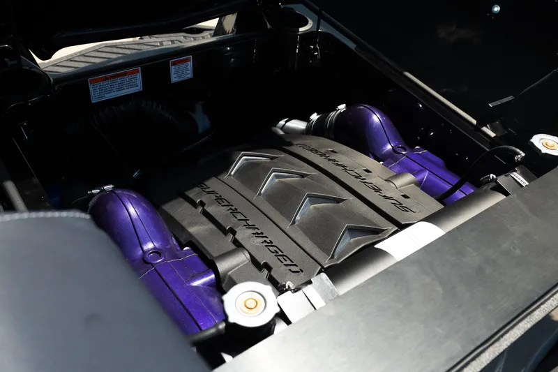 Slide: The Image of 2026 MasterCraft XStar 25 engine compartment with supercharger, showcasing advanced marine engineering. - 62
