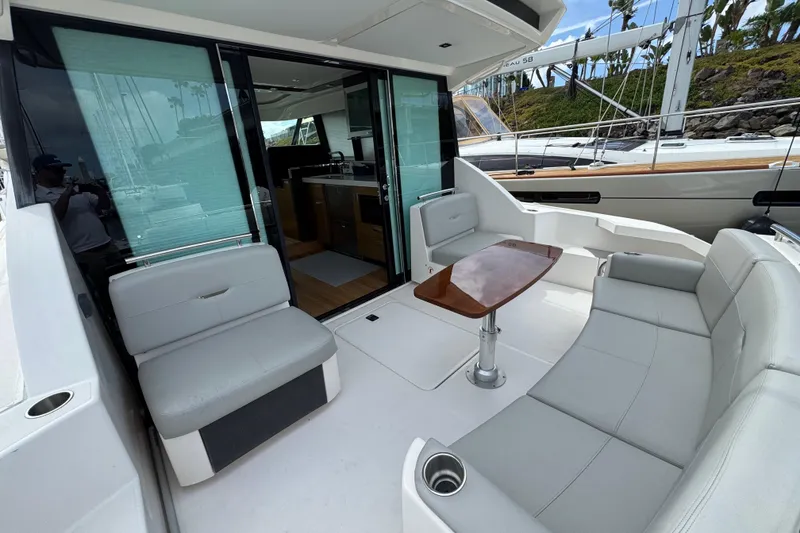 Slide: The Image of 2018 Tiara Yachts C44 Coupe interior with sleek seating and modern design. - 13
