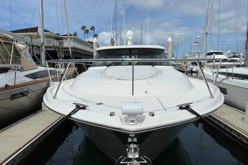 Slide: The Image of 2018 Tiara Yachts C44 Coupe docked, front view. - 5