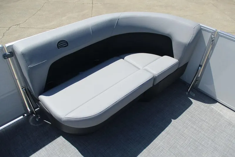 Slide: The Image of 2026 Sun Tracker Party Barge 16 DLX interior seating with gray upholstery. - 9