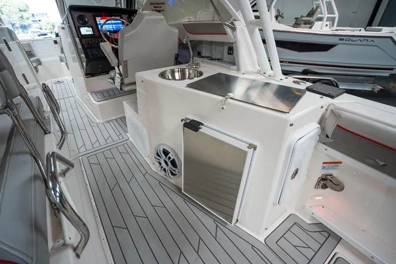 Slide: The Image of 2024 Solara S250 Dual Console interior with modern dashboard and sleek seating. - 11