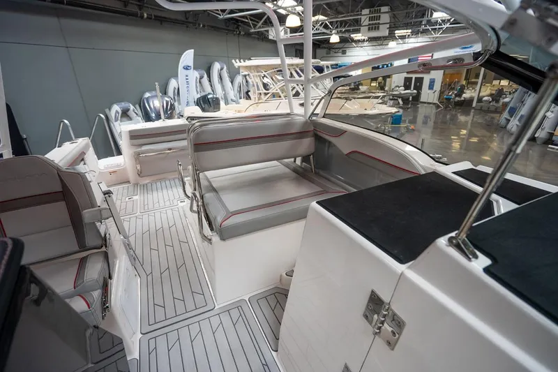 Slide: The Image of 2024 Solara S250 Dual Console boat interior with sleek seating and modern design. - 9
