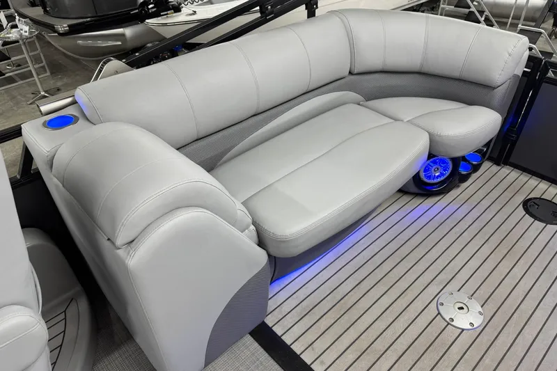 Slide: The Image of Luxurious seating on 2017 Regency 254 LE3 boat with LED lighting and cup holders. - 20