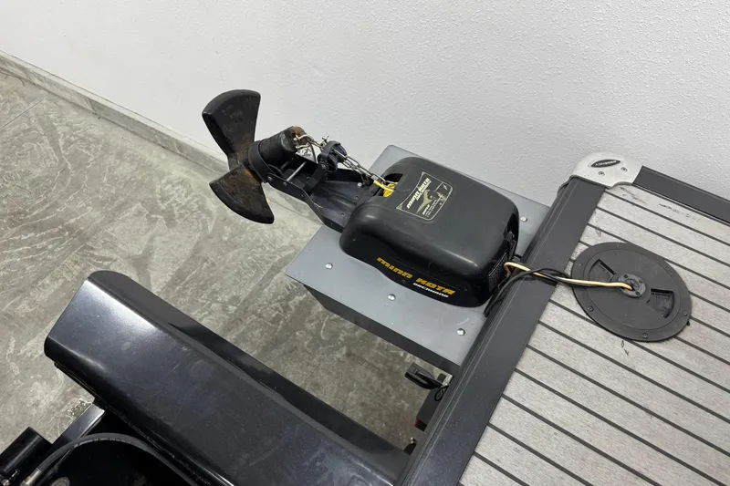 Slide: The Image of 2017 Regency 254 LE3 boat with Minn Kota trolling motor on deck. - 22