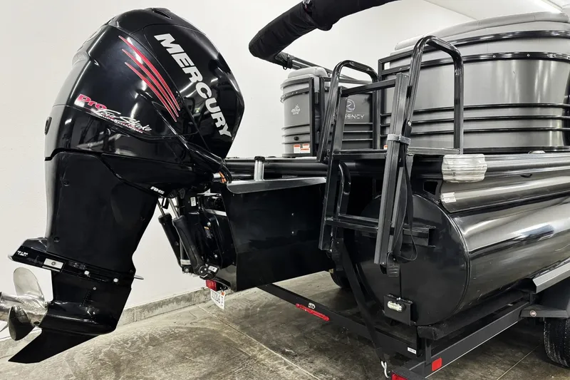 Slide: The Image of 2017 Regency 254 LE3 pontoon boat with Mercury Pro XS outboard motor. - 6
