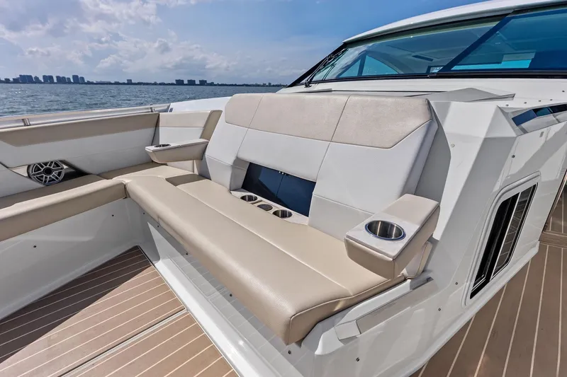 Slide: The Image of Luxurious seating on the 2025 Formula 500 Super Sport Crossover boat, with cup holders and ocean view. - 23