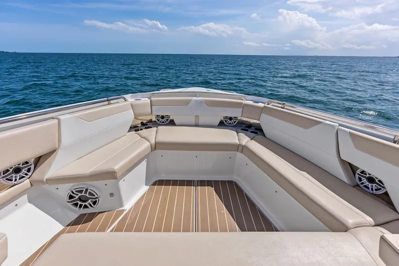 Slide: The Image of 2025 Formula 500 Super Sport Crossover boat interior with beige seating on open water. - 28