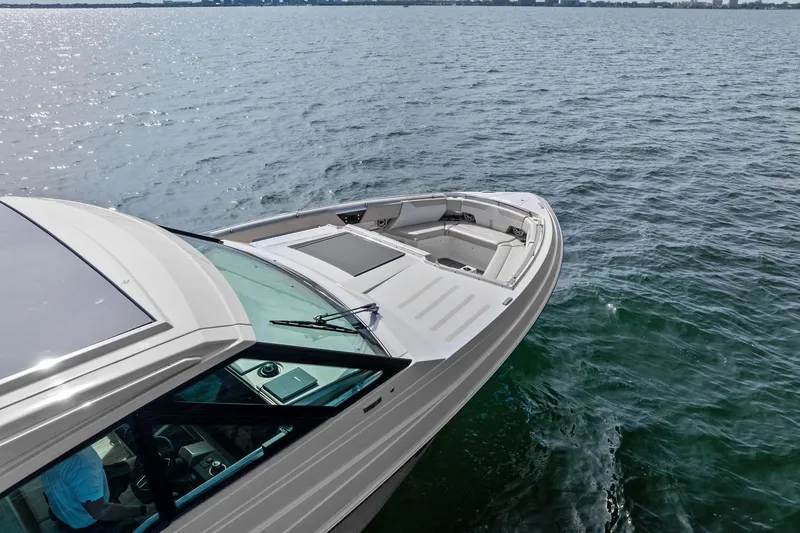 Slide: The Image of 2025 Formula 500 Super Sport Crossover boat cruising on open water. - 38