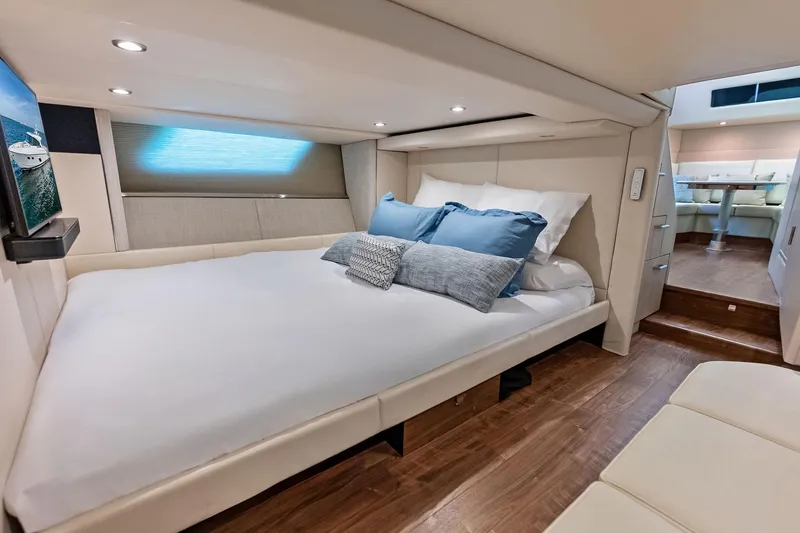 Slide: The Image of Luxurious cabin interior of 2025 Formula 500 Super Sport Crossover yacht with cozy bedding. - 41