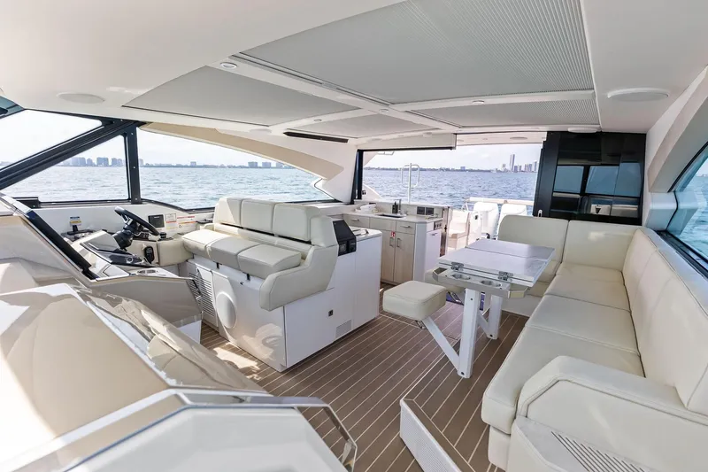 Slide: The Image of Luxurious interior of 2025 Formula 500 Super Sport Crossover yacht with modern seating and ocean view. - 44