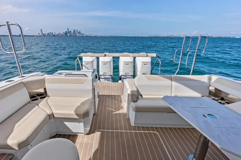 Slide: The Image of Luxurious 2025 Formula 500 Super Sport Crossover boat interior with city skyline view. - 48