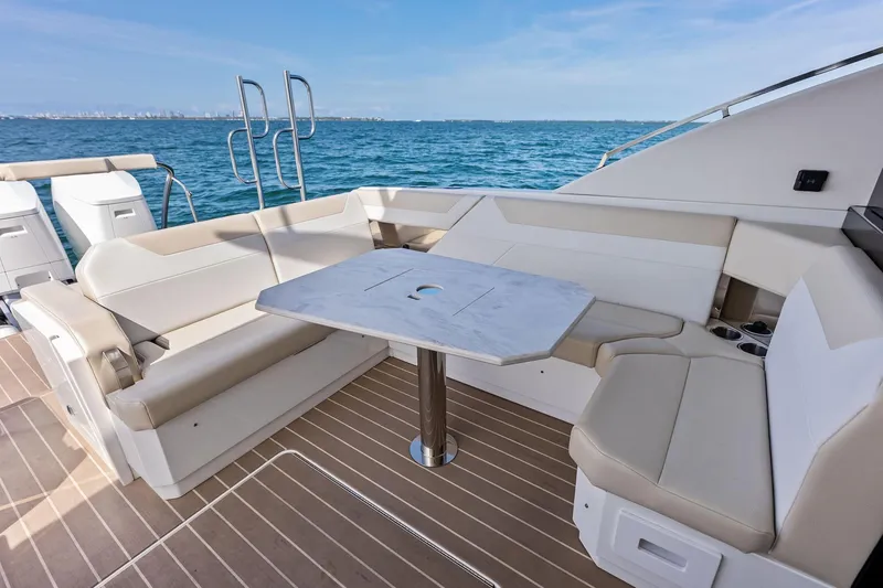 Slide: The Image of Luxurious seating area on 2025 Formula 500 Super Sport Crossover yacht with ocean view. - 49