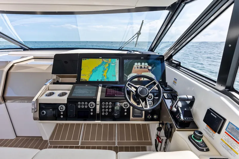 Slide: The Image of Helm of 2025 Formula 500 Super Sport Crossover with advanced navigation displays. - 53