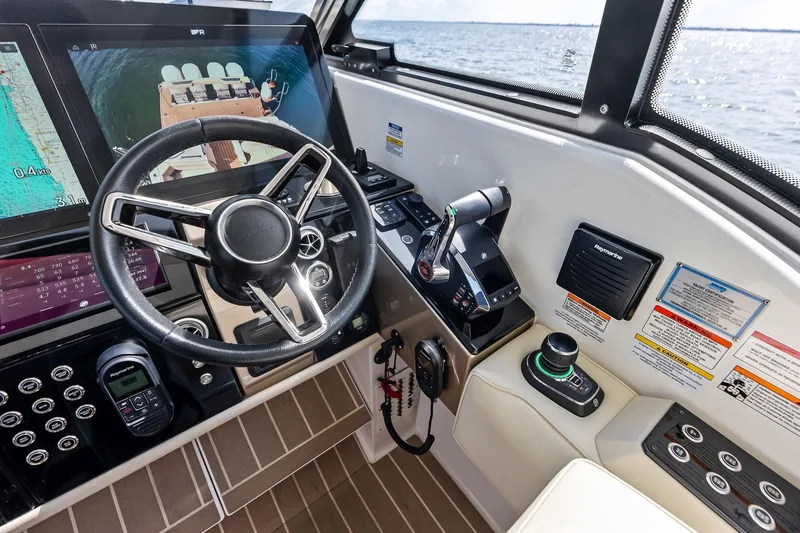 Slide: The Image of 2025 Formula 500 Super Sport Crossover helm with advanced navigation and control systems. - 54