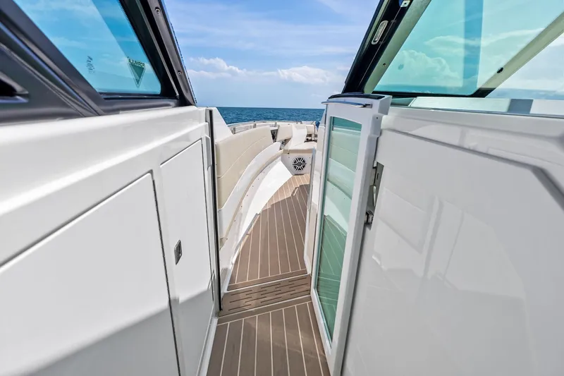 Slide: The Image of 2025 Formula 500 Super Sport Crossover boat deck with ocean view. - 58