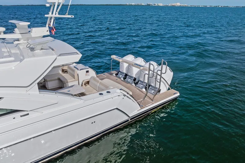 Slide: The Image of 2025 Formula 500 Super Sport Crossover yacht on open water, showcasing luxury design and powerful engines. - 7