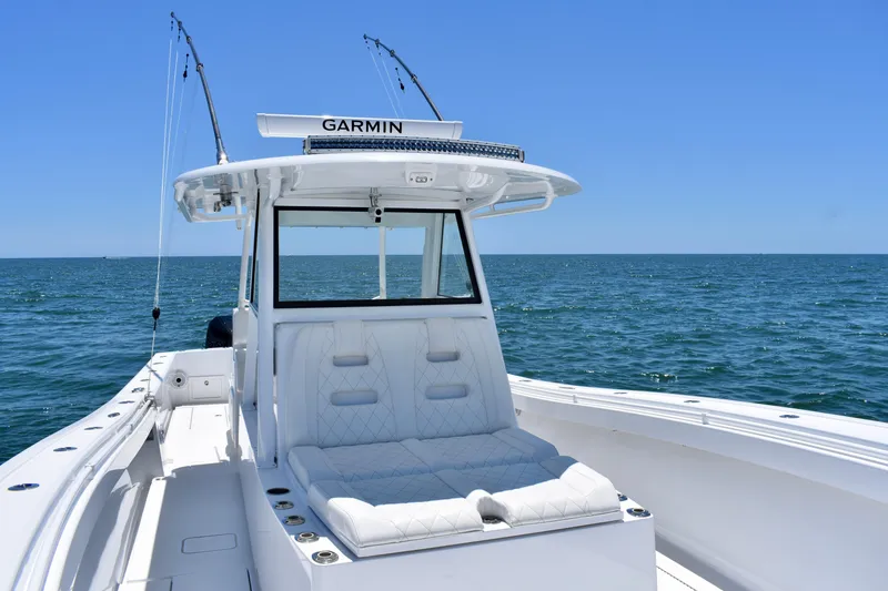 Slide: The Image of 2022 Onslow Bay 41 Tournament boat on open sea with clear blue sky. - 11