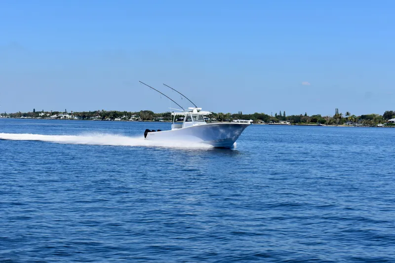 Slide: The Image of 2022 Onslow Bay 41 Tournament boat cruising on open water. - 22
