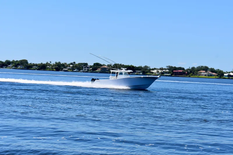 Slide: The Image of 2022 Onslow Bay 41 Tournament boat cruising on a sunny day. - 24