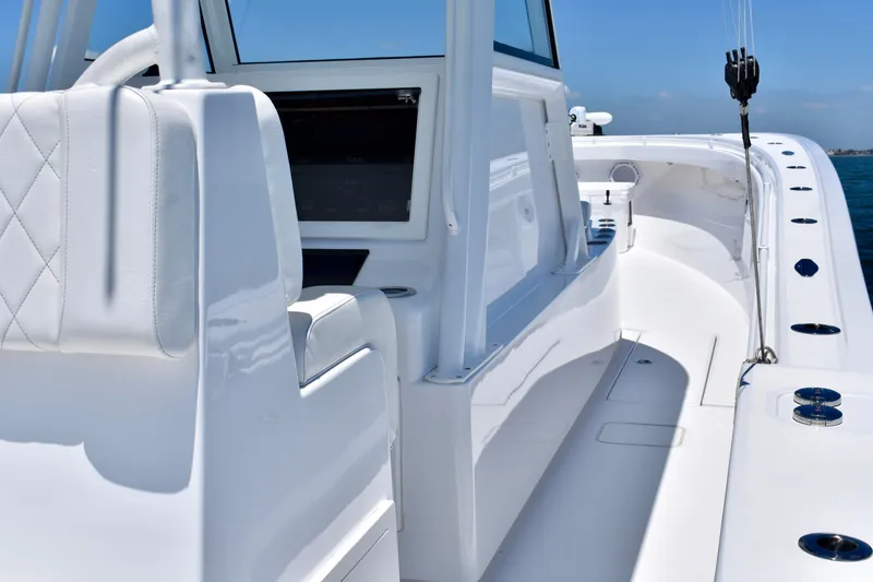 Slide: The Image of 2022 Onslow Bay 41 Tournament boat interior with sleek white design and modern features. - 6