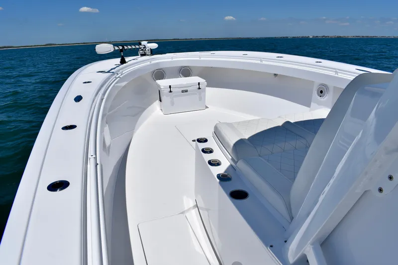 Slide: The Image of 2022 Onslow Bay 41 Tournament boat interior with seating and ocean view. - 7