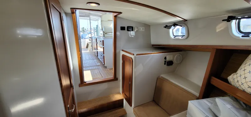 Slide: The Image of Interior of 2015 Eastport 32 OBX yacht with wooden accents. - 10