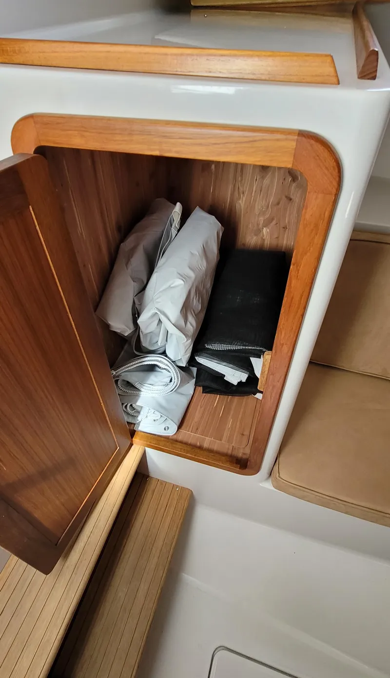 Slide: The Image of Storage compartment in Eastport 32 OBX boat, year 2015. - 13