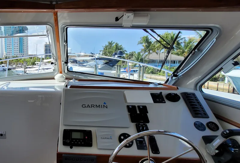 Slide: The Image of Interior view of 2015 Eastport 32 OBX with Garmin controls. - 7