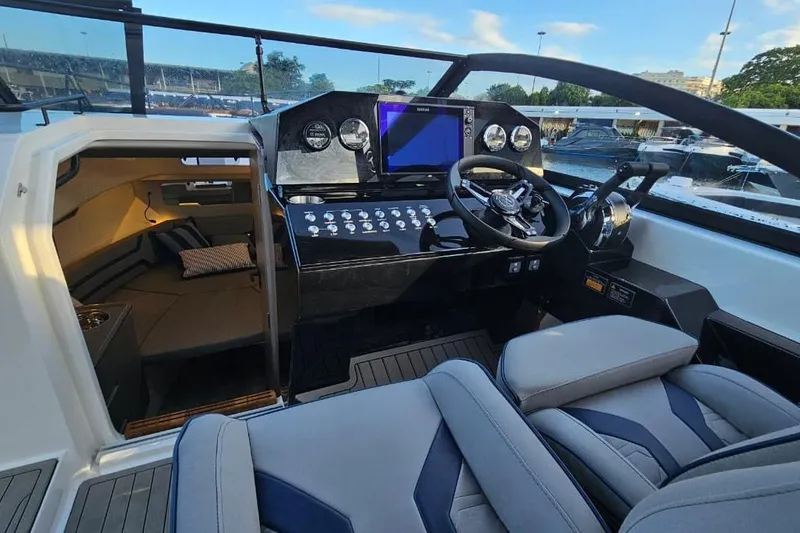 Slide: The Image of Luxurious 2027 Hanover 327 boat interior with modern cockpit and cozy cabin area. - 11