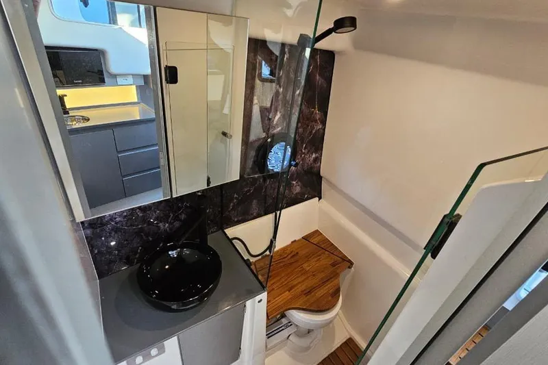 Slide: The Image of Modern bathroom in 2027 Hanover 327, featuring sleek design and compact functionality. - 15