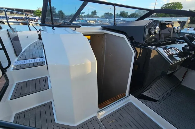 Slide: The Image of Modern Hanover 327 boat interior, 2027 model, featuring sleek design and advanced controls. - 8