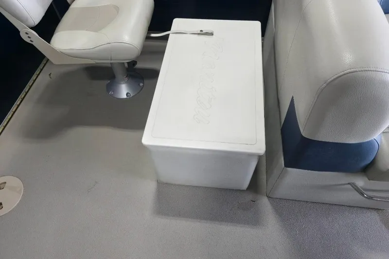 Slide: The Image of Interior of 2018 Manitou 22 Aurora LE Angler with seating and storage box. - 16