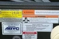 Slide: The Image of Warning and safety labels on a 2022 Crest Classic LX 200 boat. - 5