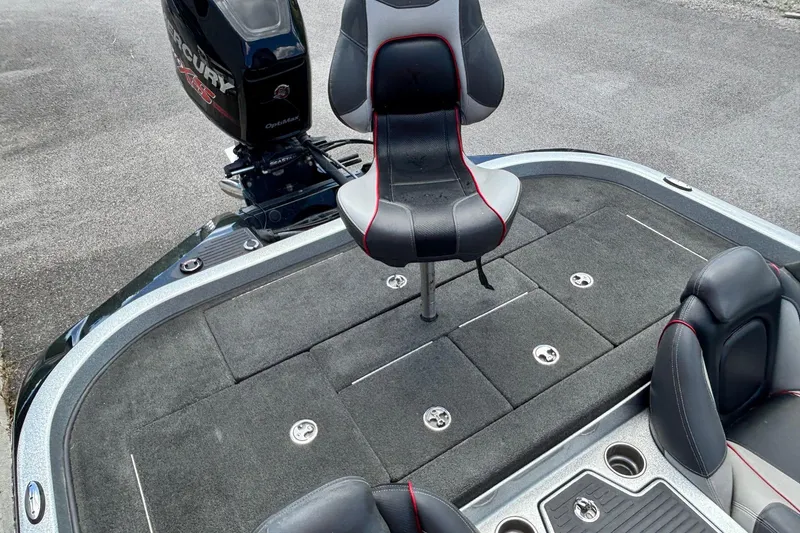 Slide: The Image of 2016 Ranger Z519 Comanche boat deck with seating and Mercury engine. - 12