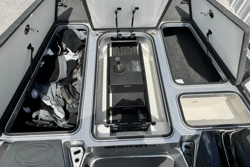 Slide: The Image of Open storage compartments on a 2016 Ranger Z519 Comanche boat deck. - 6