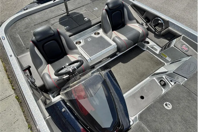Slide: The Image of 2016 Ranger Z519 Comanche boat interior with dual seats and steering console. - 7