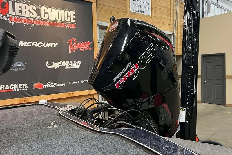 Slide: The Image of 2025 Triton 20XP Patriot with Mercury Pro XS engine at Anglers Choice showroom. - 12