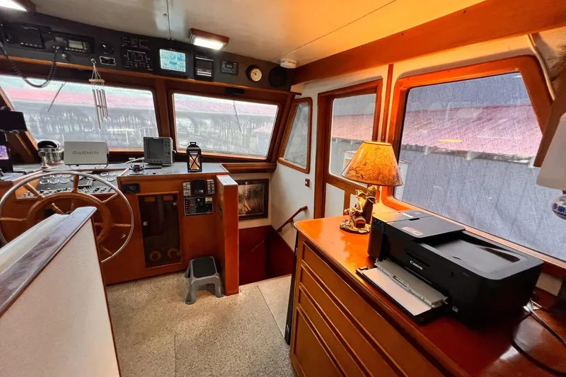 Slide: The Image of Interior of 1985 Hartman-Palmer 60 Flush Deck Motor Yacht with helm and navigation equipment. - 20