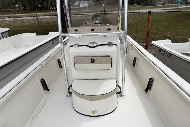 Slide: The Image of 2020 Carolina Skiff 25 LS boat interior with seating and storage. - 13