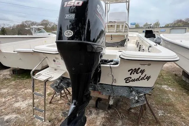 Slide: The Image of 2020 Carolina Skiff 25 LS boat with Suzuki 150 engine, named "My Buddy." - 17