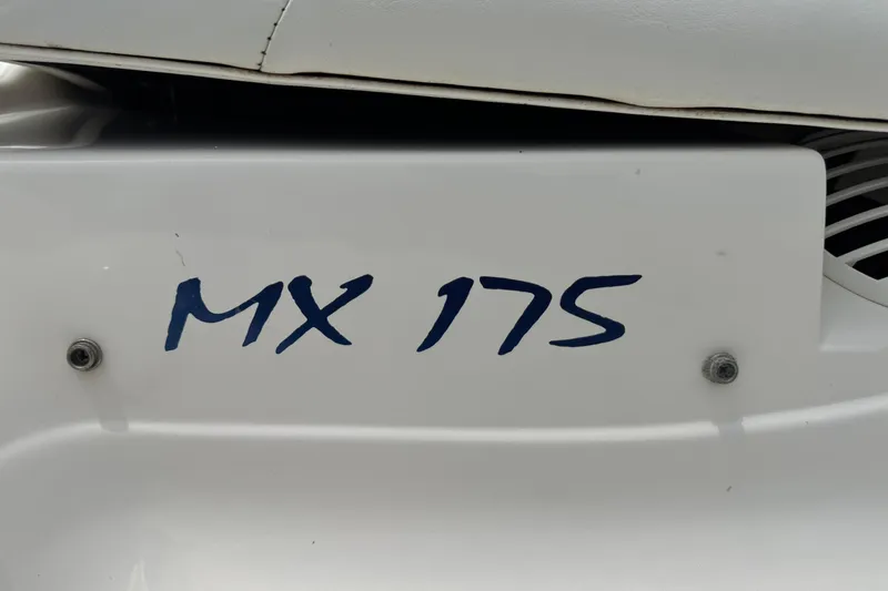 Slide: The Image of Close-up of 2008 Glastron MX 175 boat model nameplate. - 10