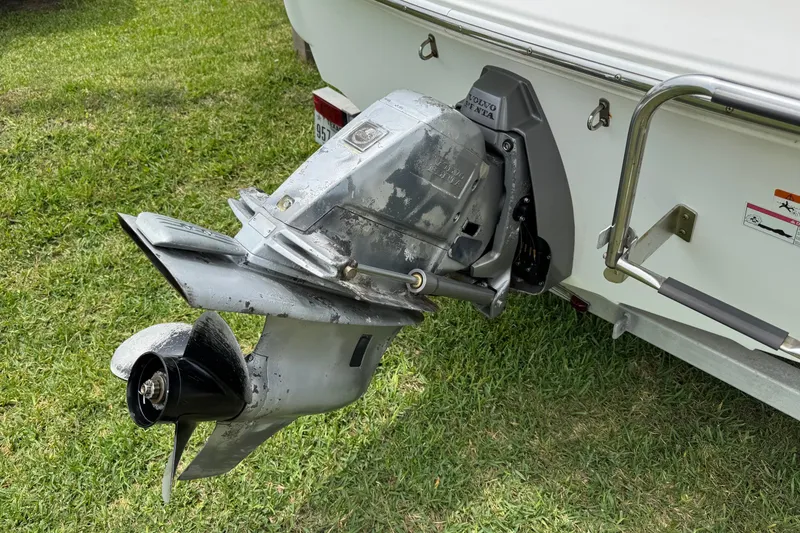 Slide: The Image of 2008 Glastron MX 175 boat with Volvo Penta outboard motor on grass. - 9